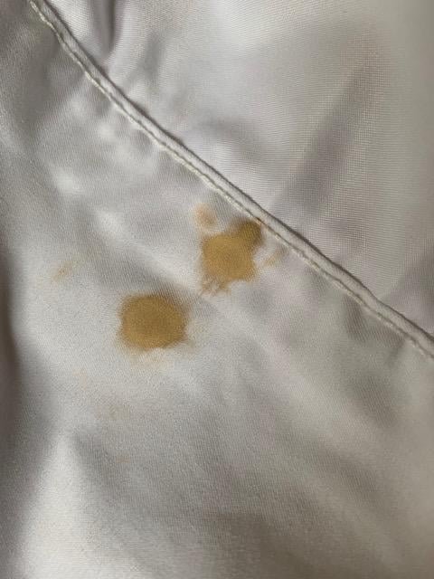 Brown Stains on Bed Sheets